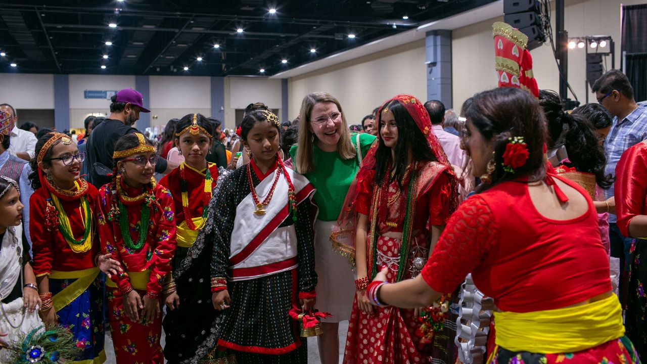 Republican state Sen. Siobhan Dunnavant speaks with kids at the Festival of India in Richmond, Virginia, on September 9, 2023.
